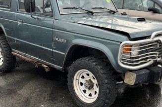 Optique avant principal gauche (feux)(phare) MITSUBISHI PAJERO 1
