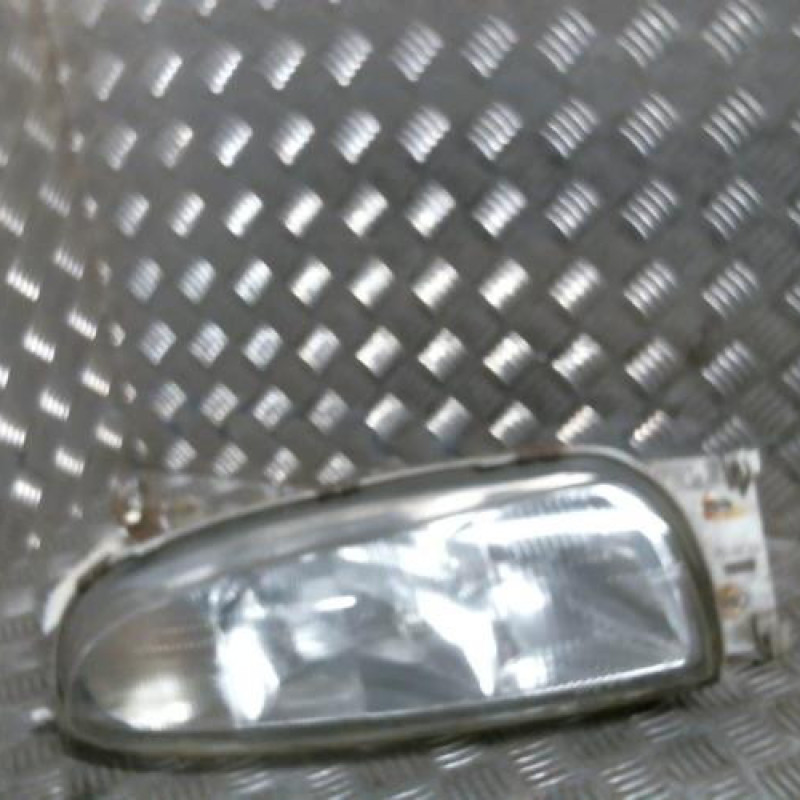 Optique avant principal gauche (feux)(phare) MAZDA 121 3 Photo n°1