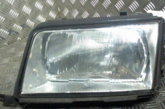 Optique avant principal gauche (feux)(phare) AUDI 100 3 Photo n°1