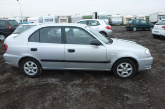 Pretensionneur de ceinture avant gauche HYUNDAI ACCENT 2