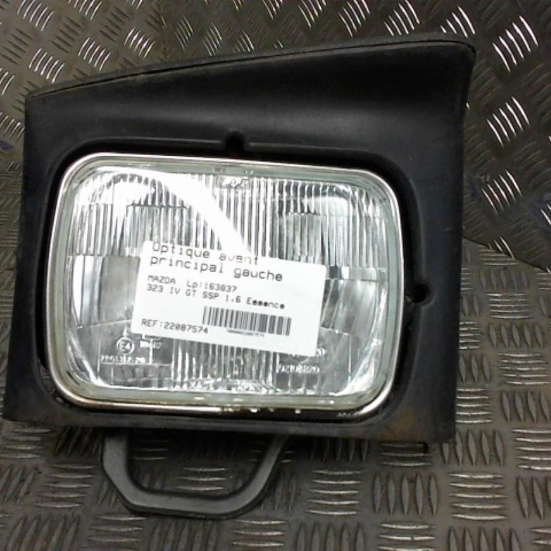 Optique avant principal gauche (feux)(phare) MAZDA 323 4 Photo n°1