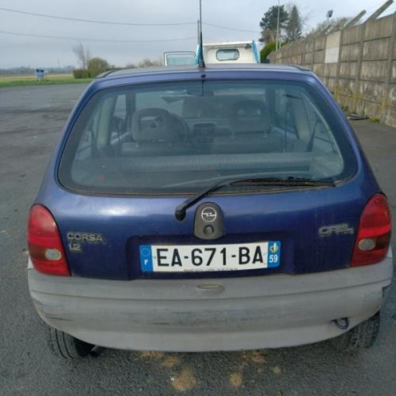 Pretensionneur de ceinture avant gauche OPEL CORSA B Photo n°11