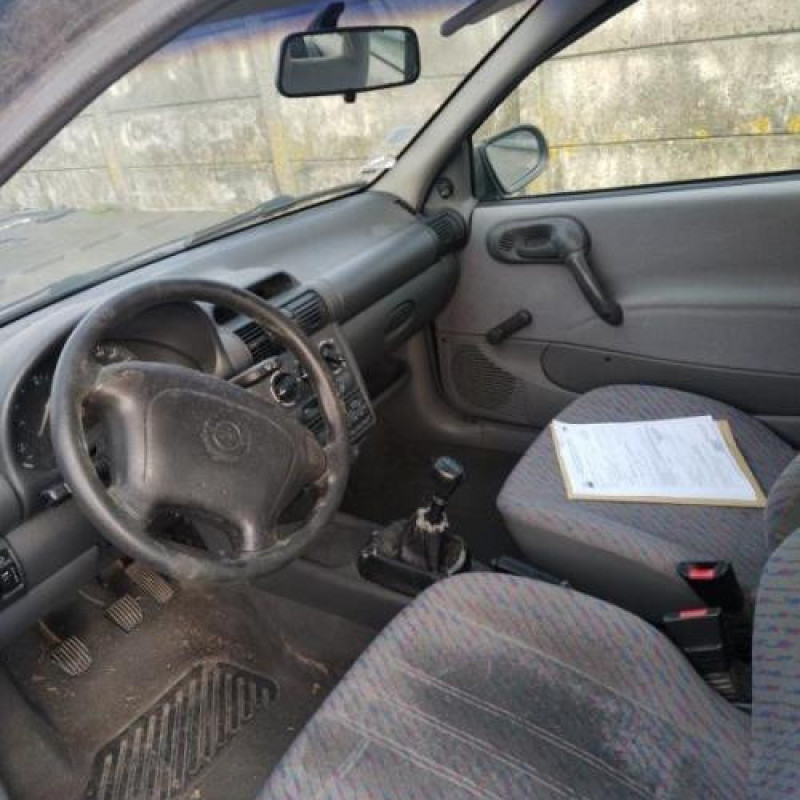 Pretensionneur de ceinture avant gauche OPEL CORSA B Photo n°12
