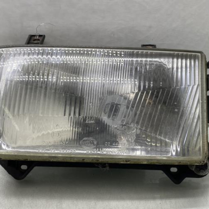 Optique avant principal gauche (feux)(phare) VOLKSWAGEN TRANSPORTER 4 Photo n°1