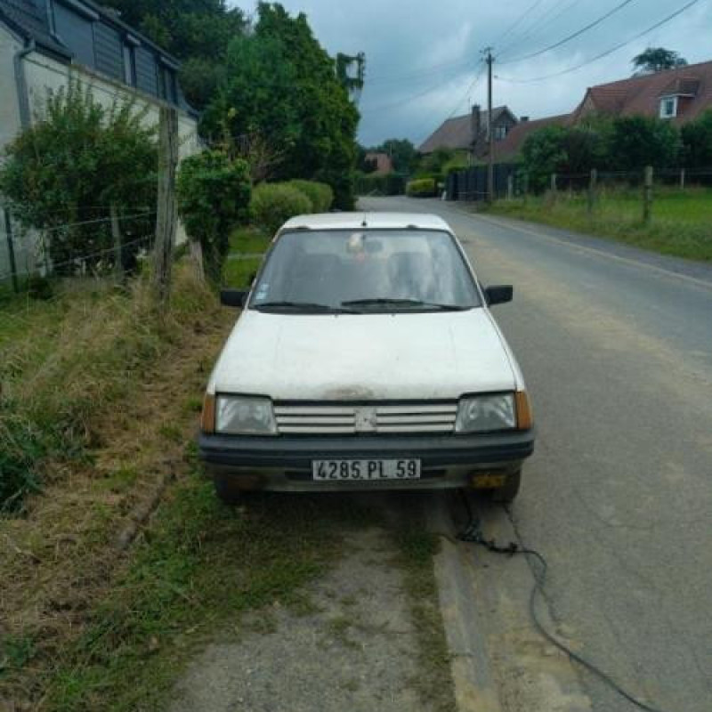 Serrure avant droit PEUGEOT 205 Photo n°6
