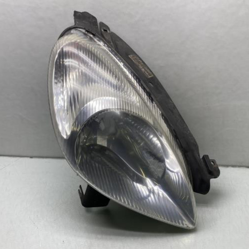 Optique avant principal gauche (feux)(phare) CITROEN XSARA PICASSO Photo n°1