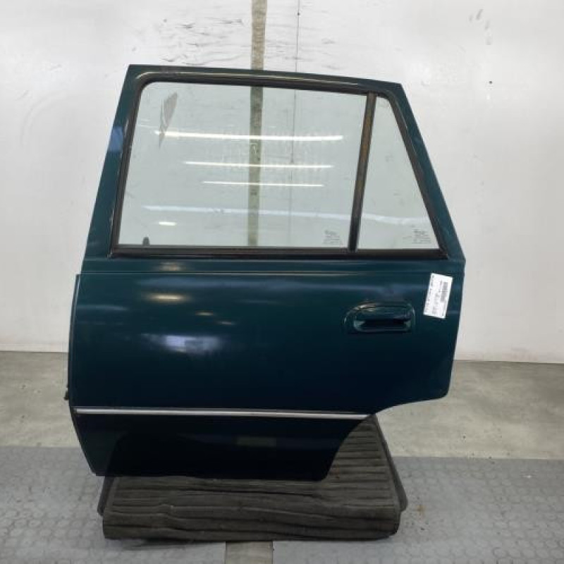 Porte arriere gauche DAEWOO NEXIA Photo n°1