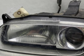 Optique avant principal gauche (feux)(phare) MAZDA 323 5 Photo n°1
