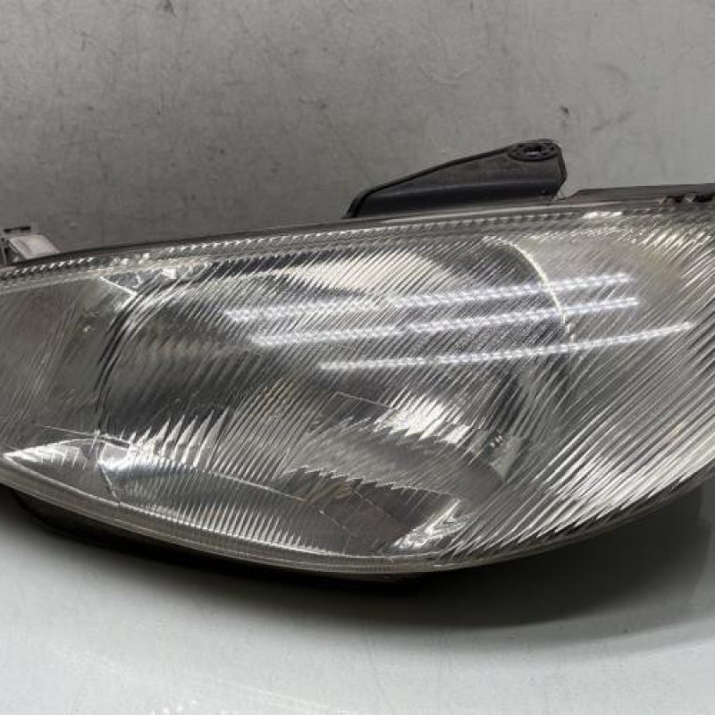 Optique avant principal gauche (feux)(phare) PEUGEOT 206 Photo n°1