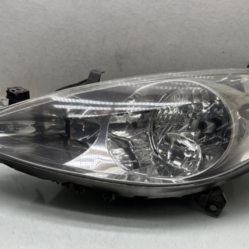 Optique avant principal gauche (feux)(phare) PEUGEOT 307 Photo n°1