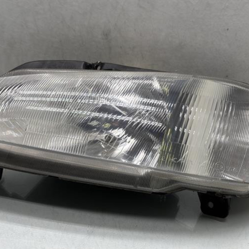 Optique avant principal gauche (feux)(phare) PEUGEOT 106 Photo n°1