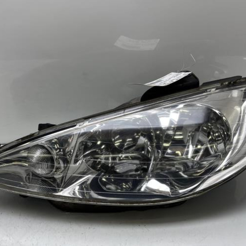 Optique avant principal gauche (feux)(phare) PEUGEOT 206 Photo n°1