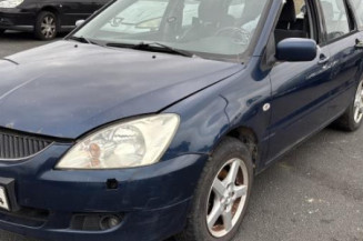 Optique avant principal gauche (feux)(phare) MITSUBISHI LANCER 3