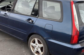 Optique avant principal gauche (feux)(phare) MITSUBISHI LANCER 3