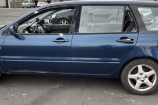 Optique avant principal gauche (feux)(phare) MITSUBISHI LANCER 3