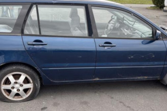 Optique avant principal gauche (feux)(phare) MITSUBISHI LANCER 3