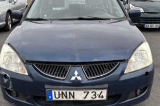 Optique avant principal gauche (feux)(phare) MITSUBISHI LANCER 3