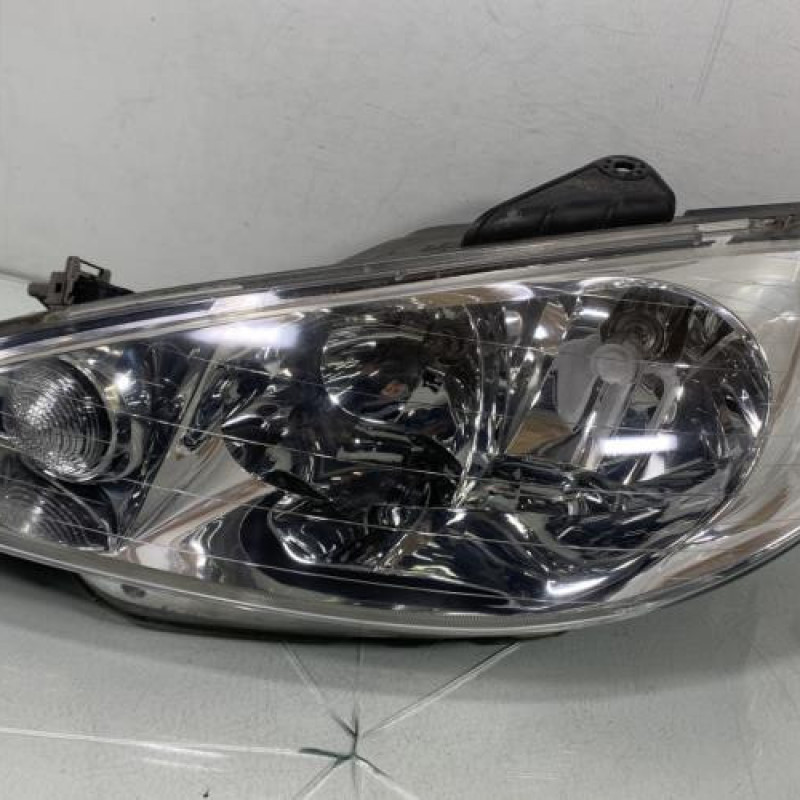 Optique avant principal gauche (feux)(phare) PEUGEOT 206 Photo n°1