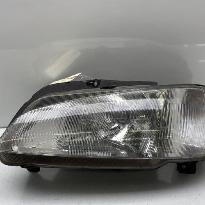 Optique avant principal gauche (feux)(phare) PEUGEOT 106 Photo n°1