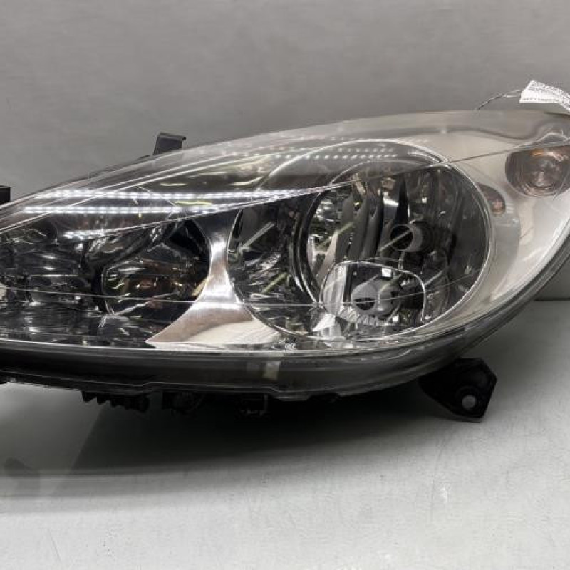 Optique avant principal gauche (feux)(phare) PEUGEOT 307 Photo n°1