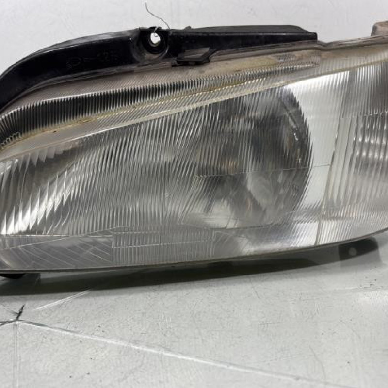 Optique avant principal gauche (feux)(phare) PEUGEOT 106 Photo n°1