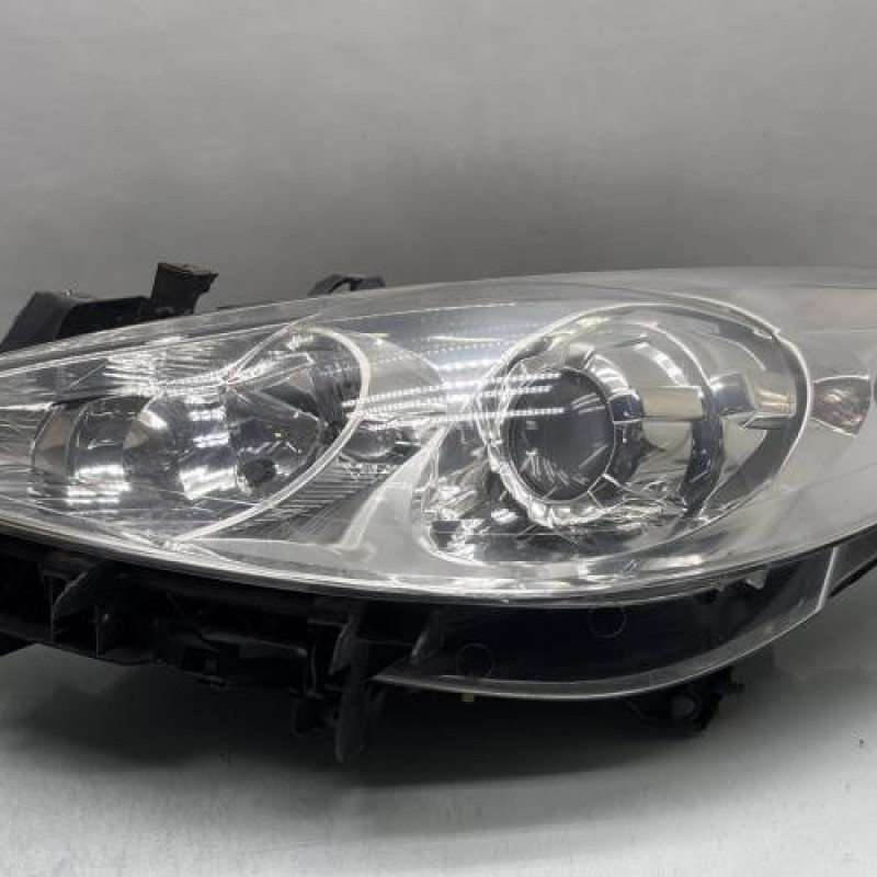 Optique avant principal gauche (feux)(phare) PEUGEOT 307 Photo n°1