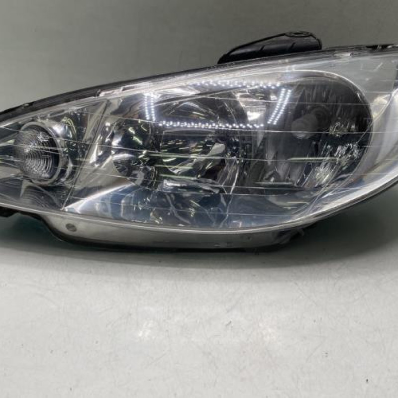 Optique avant principal gauche (feux)(phare) PEUGEOT 206 Photo n°1