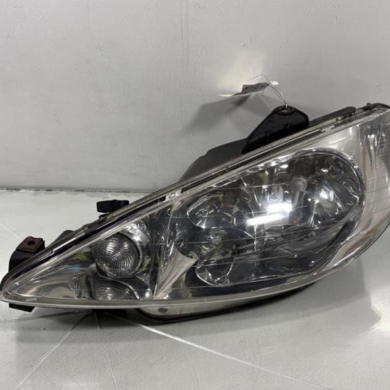 Optique avant principal gauche (feux)(phare) PEUGEOT 206 Photo n°1