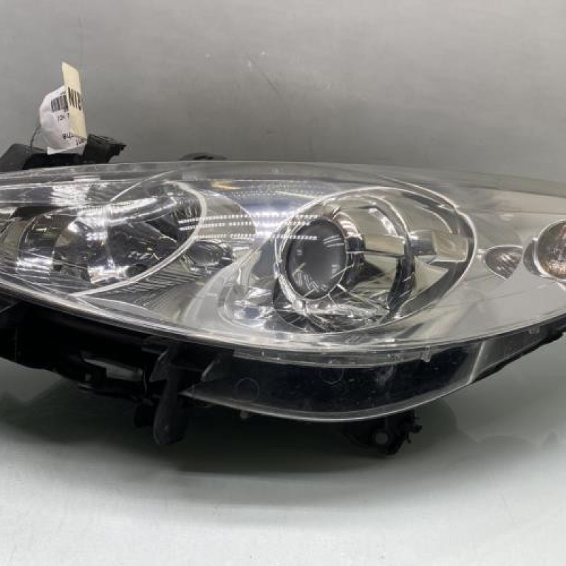 Optique avant principal gauche (feux)(phare) PEUGEOT 307 Photo n°1