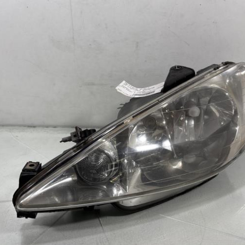 Optique avant principal gauche (feux)(phare) PEUGEOT 206 Photo n°1