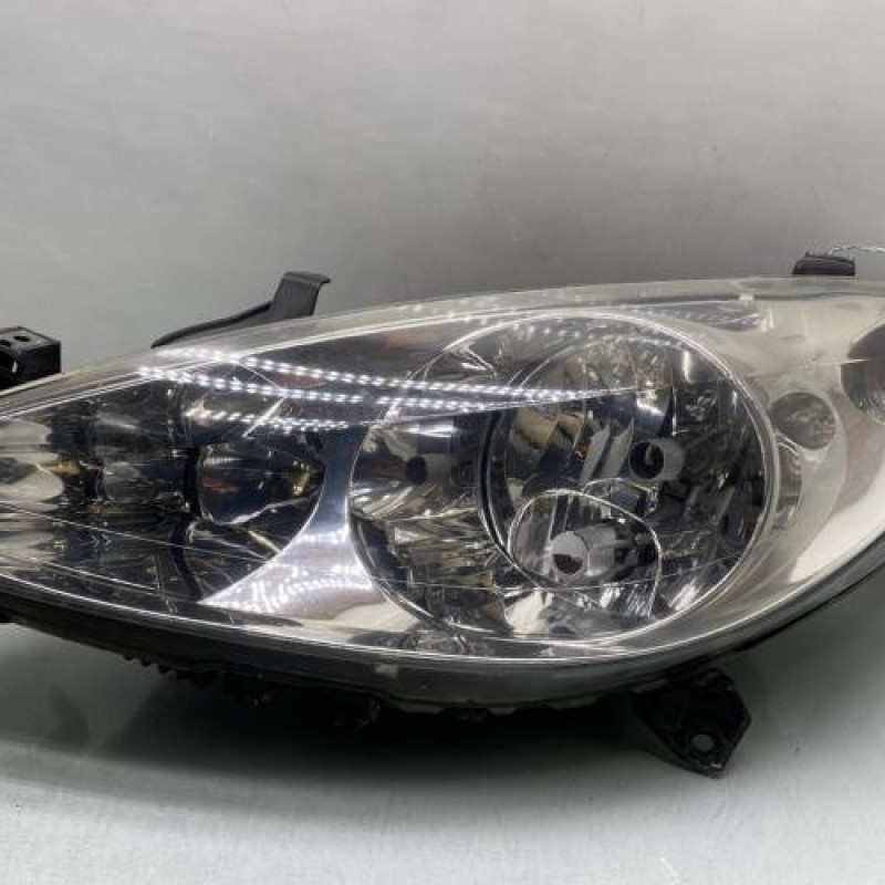 Optique avant principal gauche (feux)(phare) PEUGEOT 307 Photo n°1