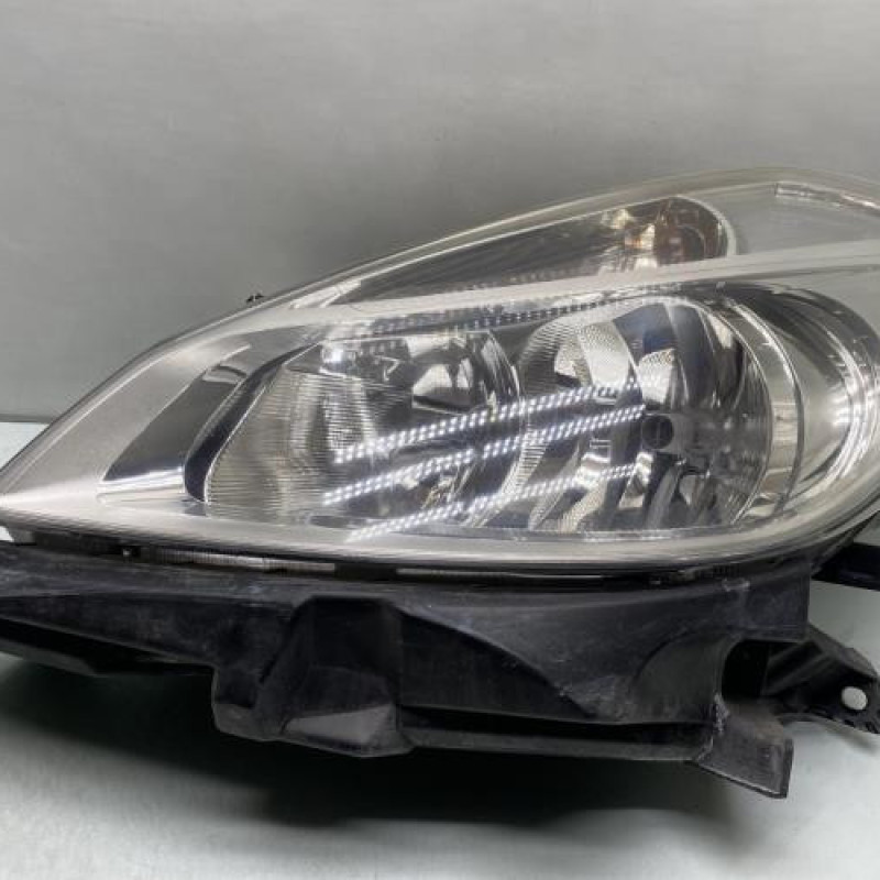 Optique avant principal gauche (feux)(phare) RENAULT CLIO 3 Photo n°1