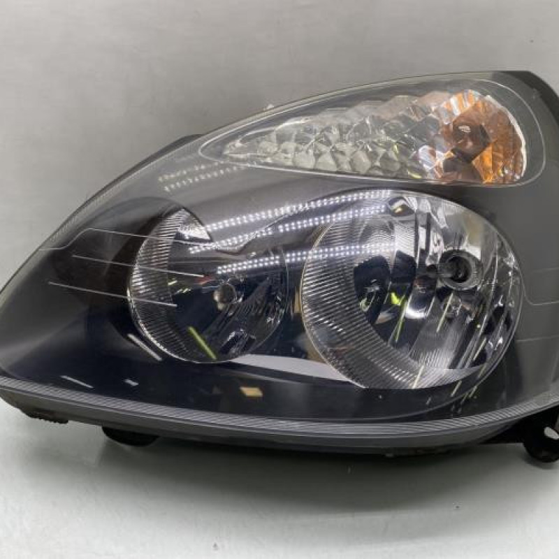 Optique avant principal gauche (feux)(phare) RENAULT CLIO 2 Photo n°1