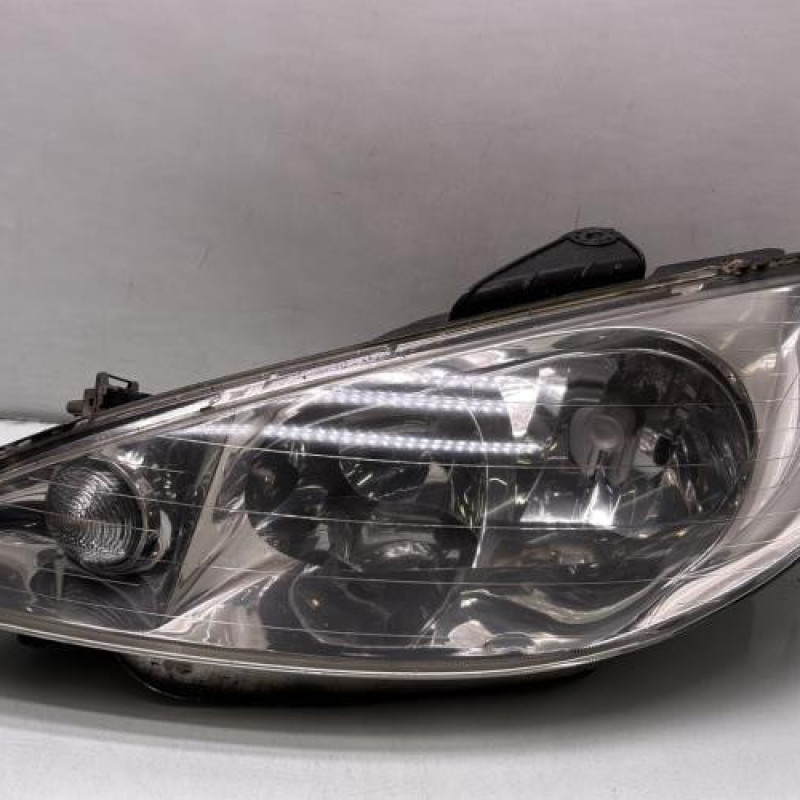 Optique avant principal gauche (feux)(phare) PEUGEOT 206 Photo n°1