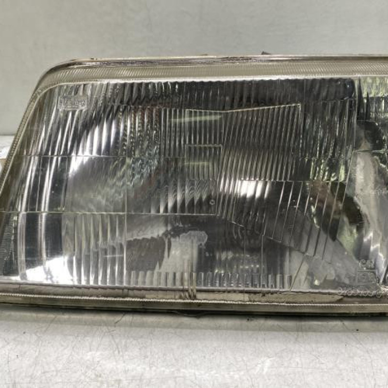 Optique avant principal gauche (feux)(phare) PEUGEOT 205 Photo n°1