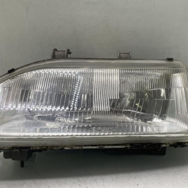 Optique avant principal gauche (feux)(phare) HONDA CONCERTO Photo n°1