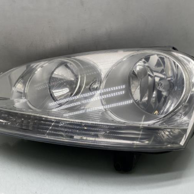 Optique avant principal gauche (feux)(phare) VOLKSWAGEN GOLF 5 Photo n°1