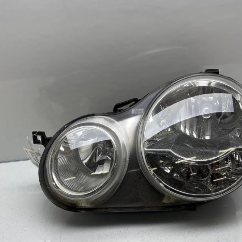 Optique avant principal gauche (feux)(phare) VOLKSWAGEN POLO 4 Photo n°1