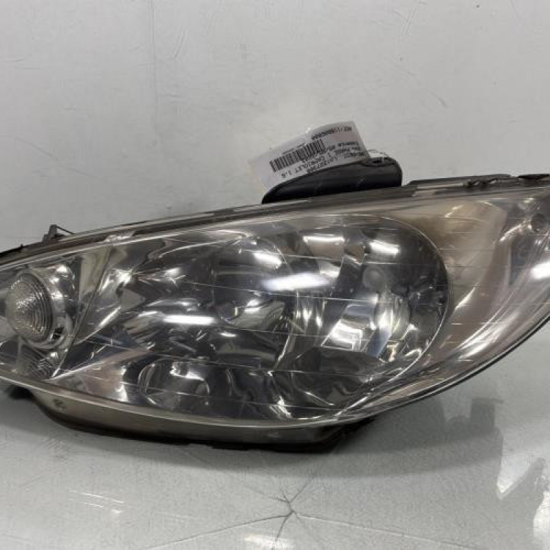 Optique avant principal gauche (feux)(phare) PEUGEOT 206 Photo n°1