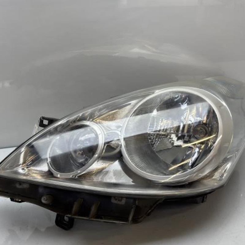 Optique avant principal gauche (feux)(phare) NISSAN NOTE 1 Photo n°1