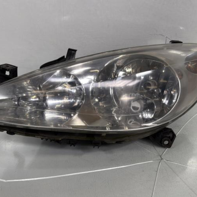 Optique avant principal gauche (feux)(phare) PEUGEOT 307 Photo n°1