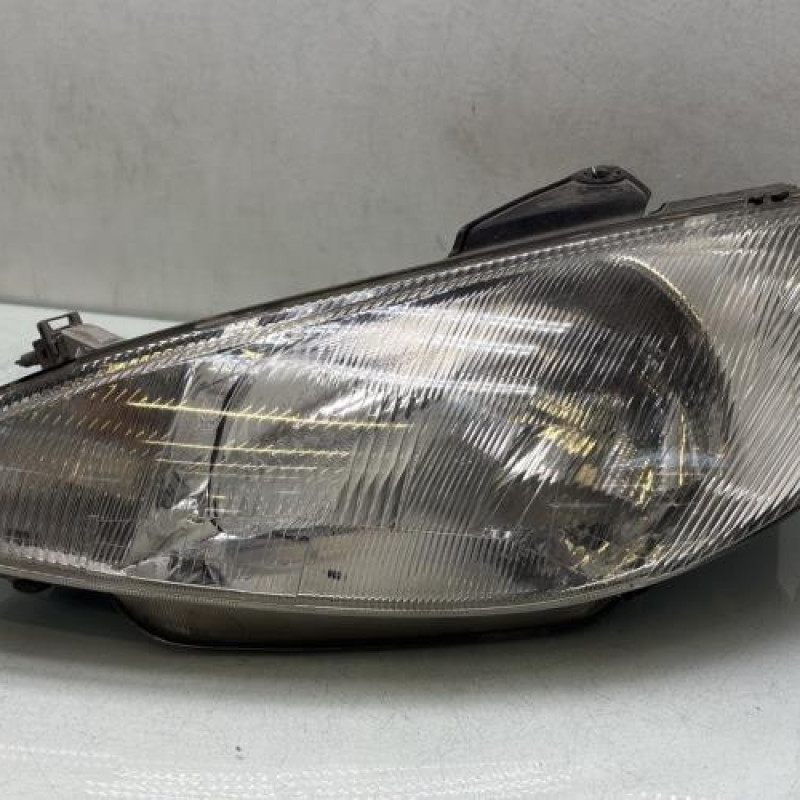 Optique avant principal gauche (feux)(phare) PEUGEOT 206 Photo n°1