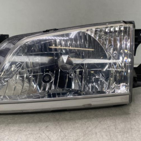 Optique avant principal gauche (feux)(phare) MAZDA DEMIO Photo n°1