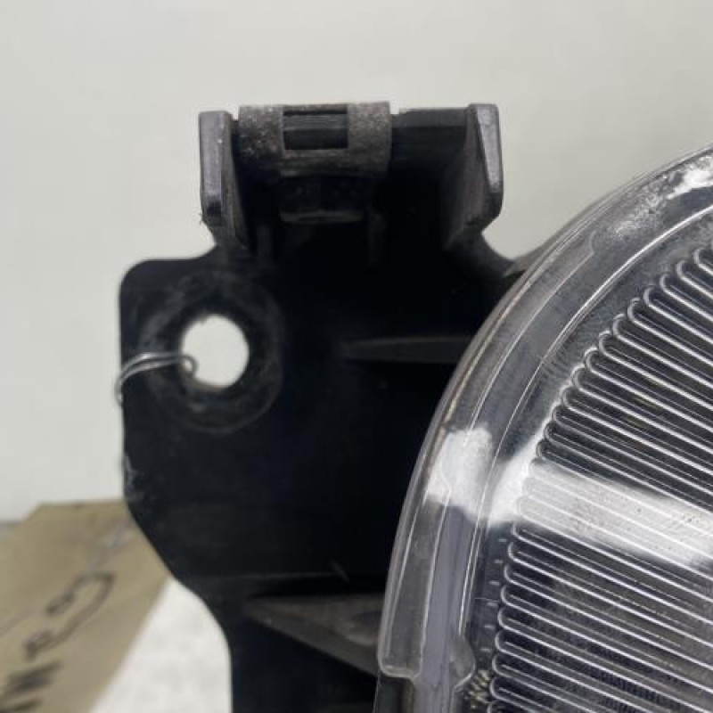 Optique avant principal gauche (feux)(phare) MAZDA DEMIO Photo n°4