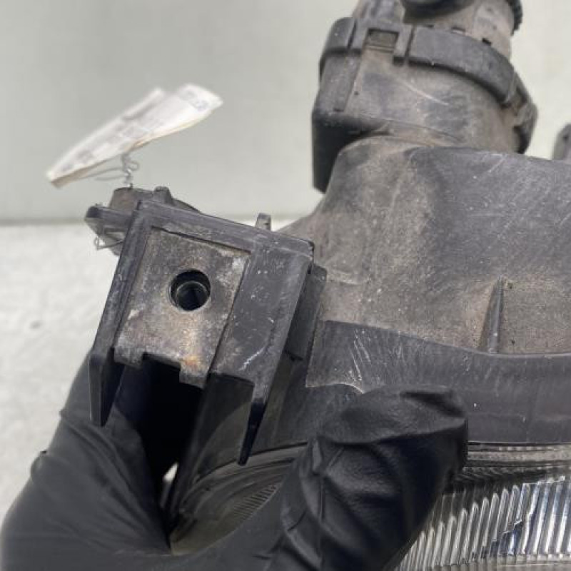 Optique avant principal gauche (feux)(phare) MAZDA DEMIO Photo n°5