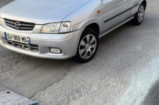 Optique avant principal gauche (feux)(phare) MAZDA DEMIO