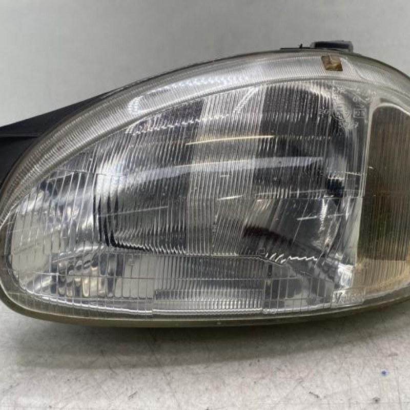 Optique avant principal gauche (feux)(phare) OPEL CORSA B Photo n°1