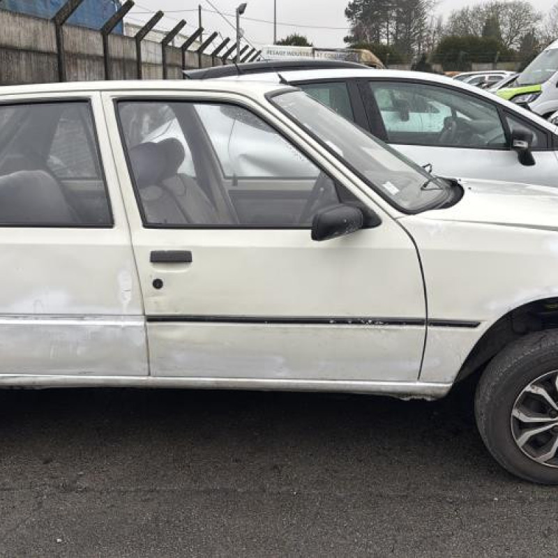 Amortisseur avant droit PEUGEOT 205 Photo n°8