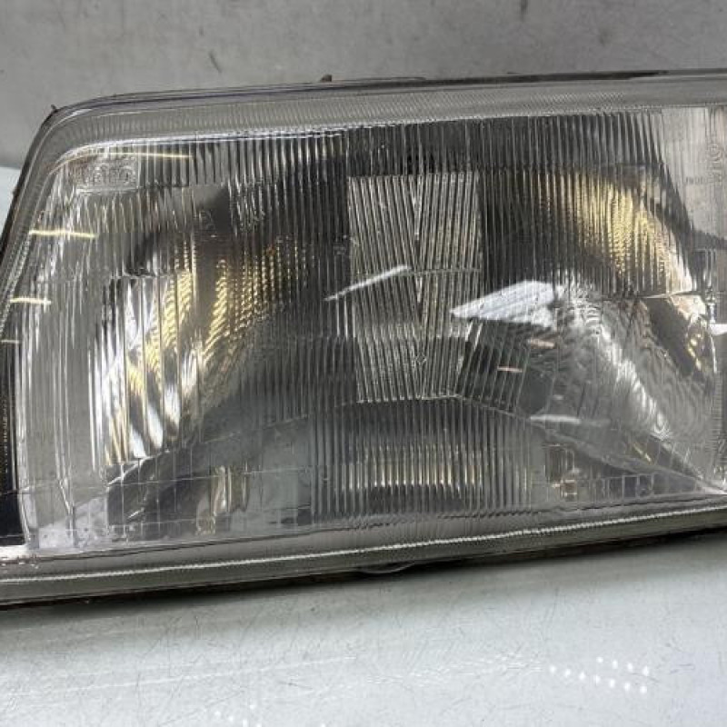 Optique avant principal gauche (feux)(phare) PEUGEOT 205 Photo n°1