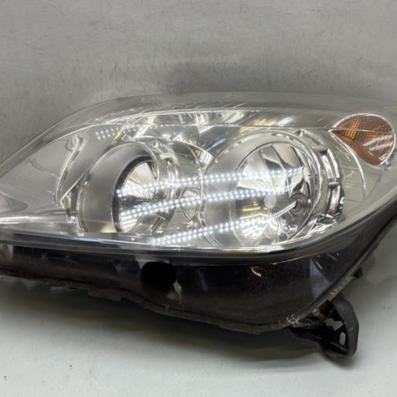 Optique avant principal gauche (feux)(phare) OPEL ASTRA H Photo n°1